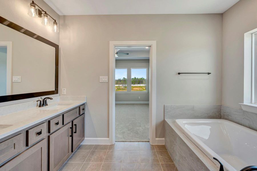 Furnished interior view inside a new home in COLTON - Reserve Collection, Todd Mission (Image 7).