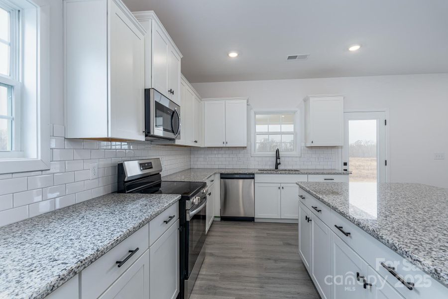 Furnished interior view inside a new home in Kerns Ridge, Salisbury (Image 6).