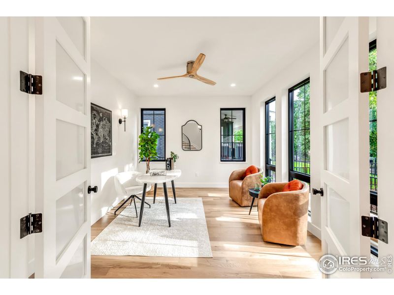 Main floor office is to the right of the entry and offers leafy views and privacy