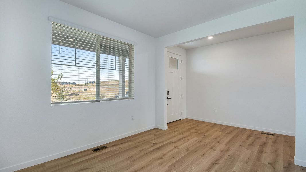 Spacious, unfurnished interior of a new home in Trails at Crowfoot, Parker (Image 14).