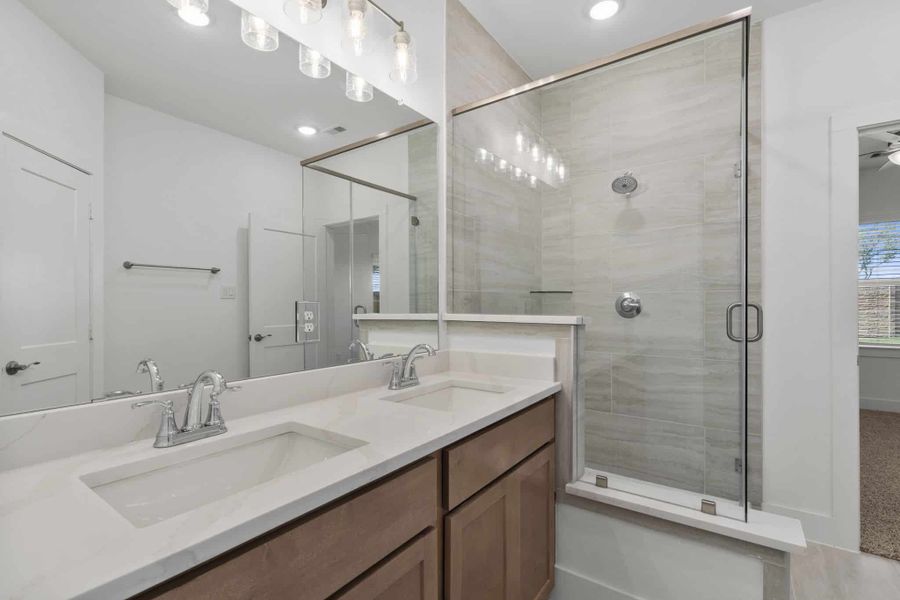 Furnished interior view inside a new home in Meridiana, Manvel (Image 9).