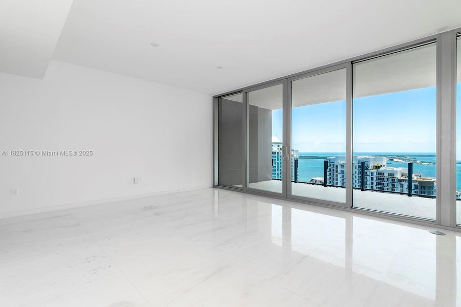 Spacious, unfurnished interior of a new home in Aston Martin Residences, Miami (Image 26).