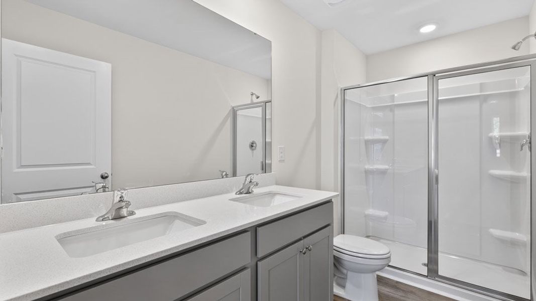 Furnished interior view inside a new home in The Townes at Honeycutt Oaks, Angier (Image 10).