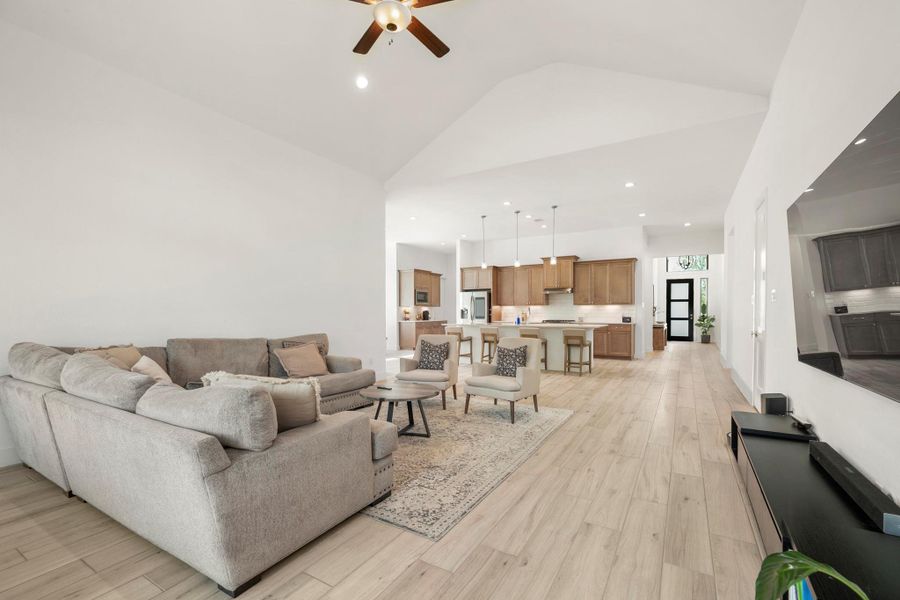 The heart of the home is its open-concept kitchen and living area, ideal for entertaining or relaxing with family. The open concept living room and kitchen makes for a great way to keep the party going and never miss a beat! The heart of the home is its open-concept kitchen and living area, ideal for entertaining or relaxing with family. The open concept living room and kitchen makes for a great way to keep the party going and never miss a beat!