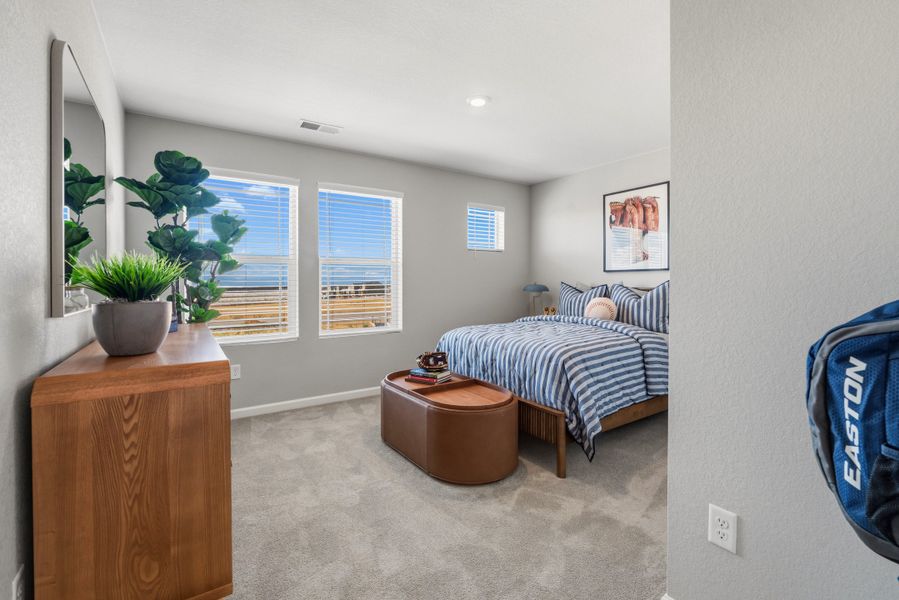 Representative furnished interior of a home built from the 4008 by Risewell Homes in Harvest Crossing, Aurora (Image 24).