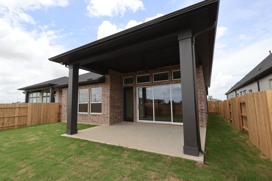 Exterior details and patio area of a home in Elyson - Reserve Collection, Katy (Image 3).