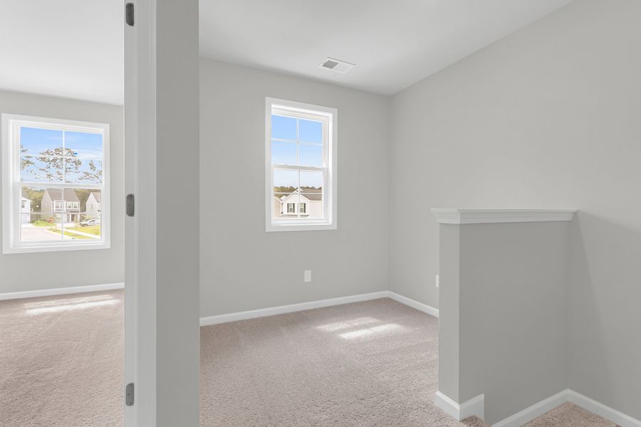 Spacious, unfurnished interior of a new home in Central Creek, Goose Creek (Image 30).