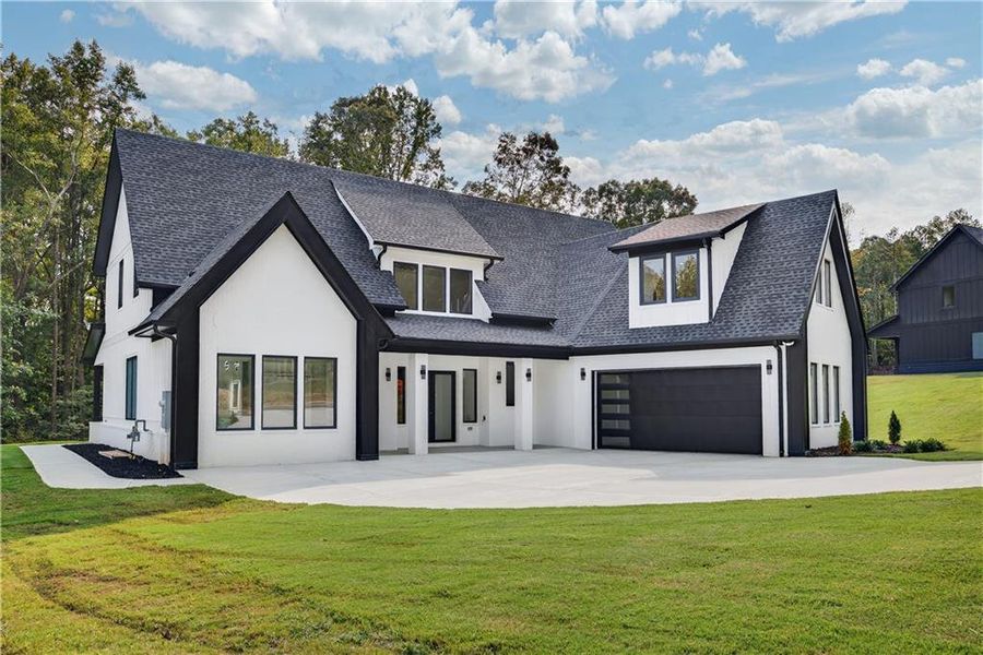 Front exterior of a new home in , Auburn, GA, highlighting curb appeal (Image 25).