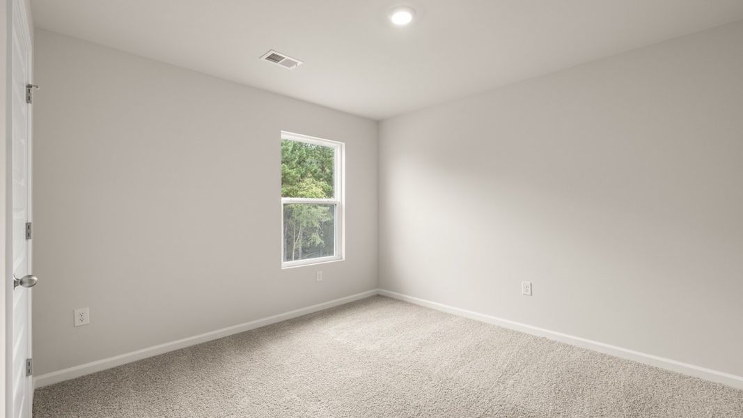 Spacious, unfurnished interior of a new home in Preserve at Dove Creek, Statham (Image 24).