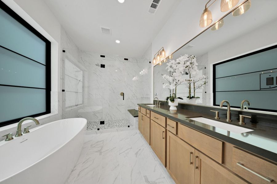 Primary bathroom with double vanity. Primary bathroom with double vanity.