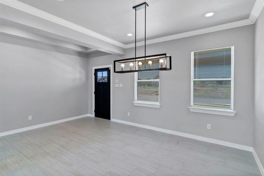 Unfurnished room with ornamental molding