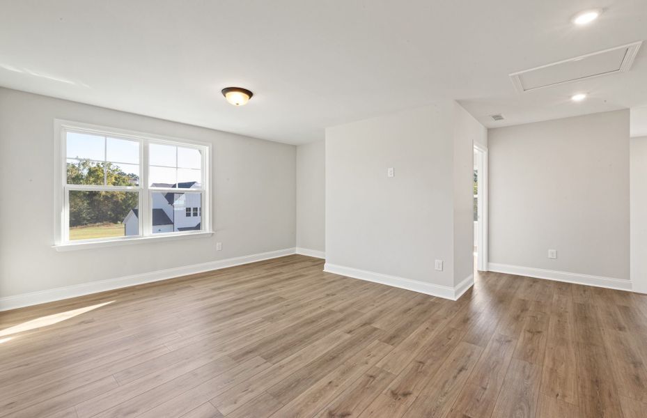 Spacious, unfurnished interior of a new home in Browning Stables, Wendell (Image 49).