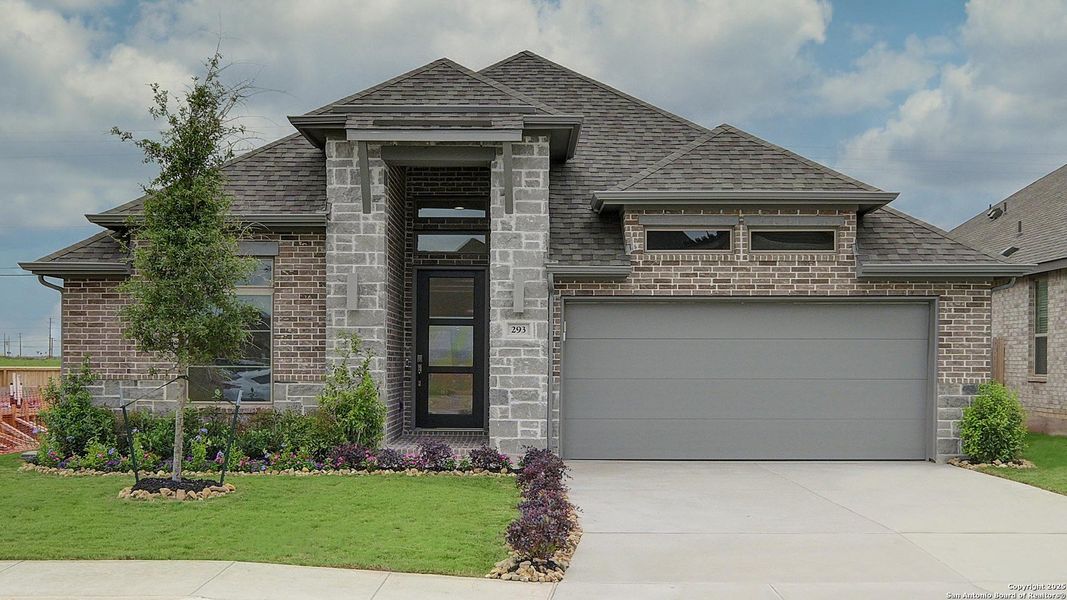 Front exterior of a new home in Alsatian Oaks 50', Castroville, TX, highlighting curb appeal (Image 2).