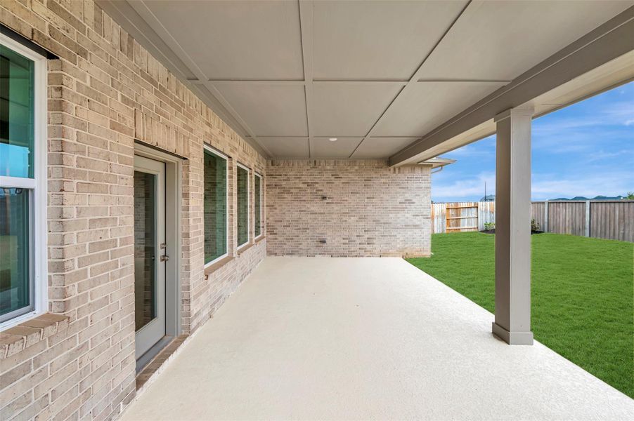 Exterior details and patio area of a home in The Grand Prairie - Retreat Collection, Hockley (Image 4).