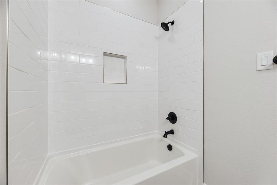 Bathroom with washtub / shower combination Bathroom with washtub / shower combination