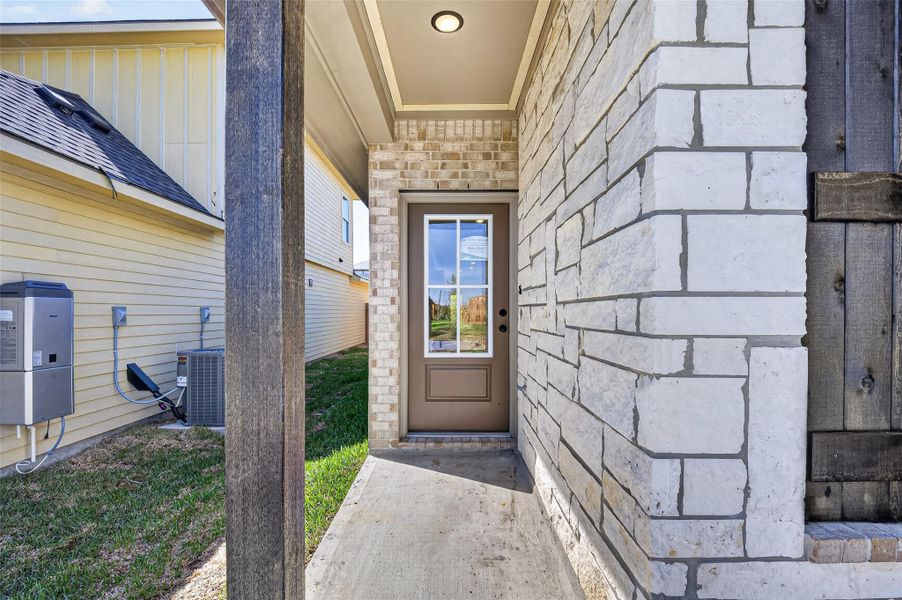 Exterior details and patio area of a home in Mostyn Springs, Magnolia (Image 3).