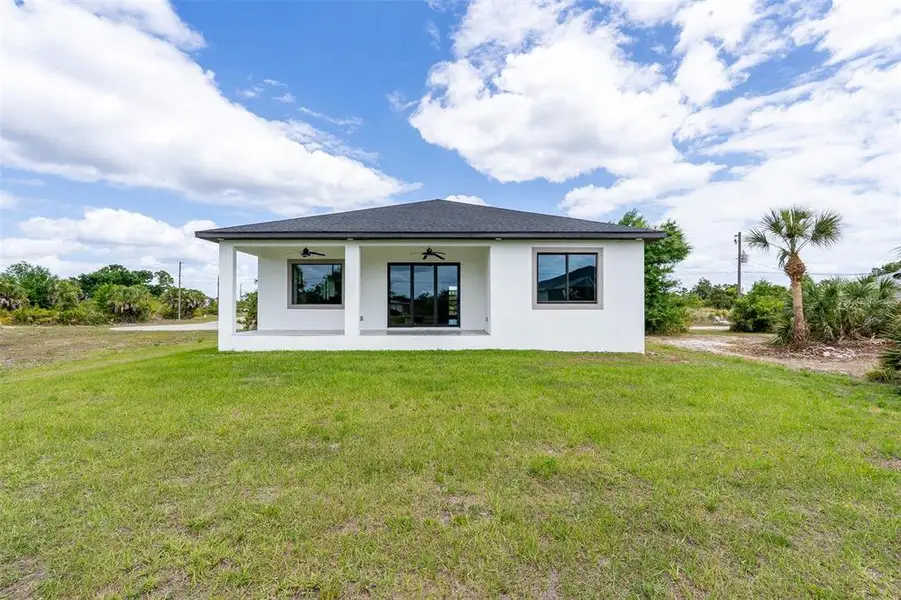 Exterior details and patio area of a home in , Rotonda West (Image 3).