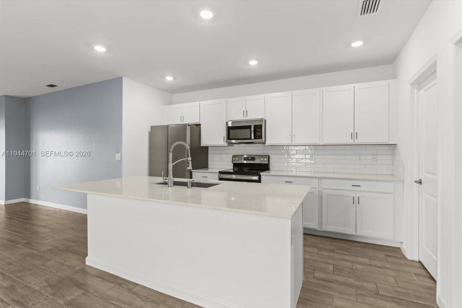 Furnished interior view inside a new home in , Fort Pierce (Image 11).