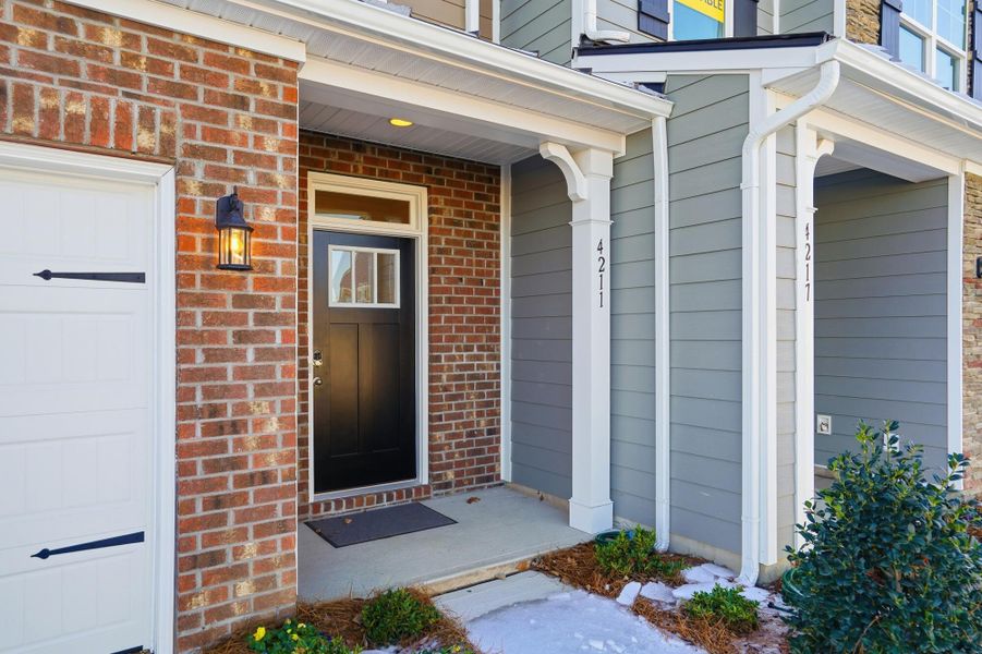 Exterior details and patio area of a home in Harrisburg Village Townhomes, Harrisburg (Image 3). Exterior details and patio area of a home in Harrisburg Village Townhomes, Harrisburg (Image 3).