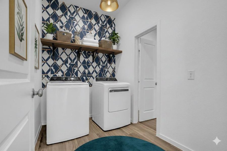 Laundry Room (Virtually Staged): Virtually staged to help visualize how the space functions as an extension of the primary suite. Direct access from the walk-in closet creates an efficient daily routine. The layout allows flexibility for future shelving or cabinetry if desired. Laundry Room (Virtually Staged): Virtually staged to help visualize how the space functions as an extension of the primary suite. Direct access from the walk-in closet creates an efficient daily routine. The layout allows flexibility for future shelving or cabinetry if desired.