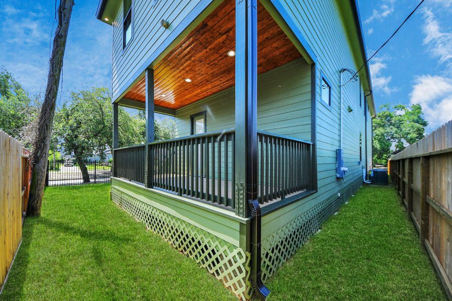 Exterior details and patio area of a home in , Houston (Image 3).