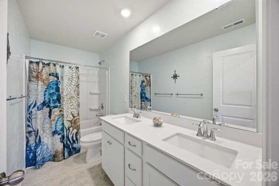 Furnished interior view inside a new home in Falls Cove at Lake Norman, Troutman (Image 37).