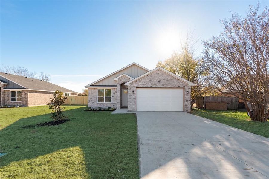 Front exterior of a new home in , Forney, TX, highlighting curb appeal (Image 20). Front exterior of a new home in , Forney, TX, highlighting curb appeal (Image 20).