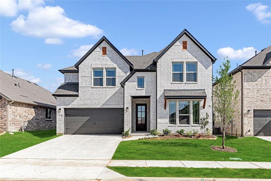 Front exterior of a new home in Creekview Meadows, Celina, TX, highlighting curb appeal (Image 2).