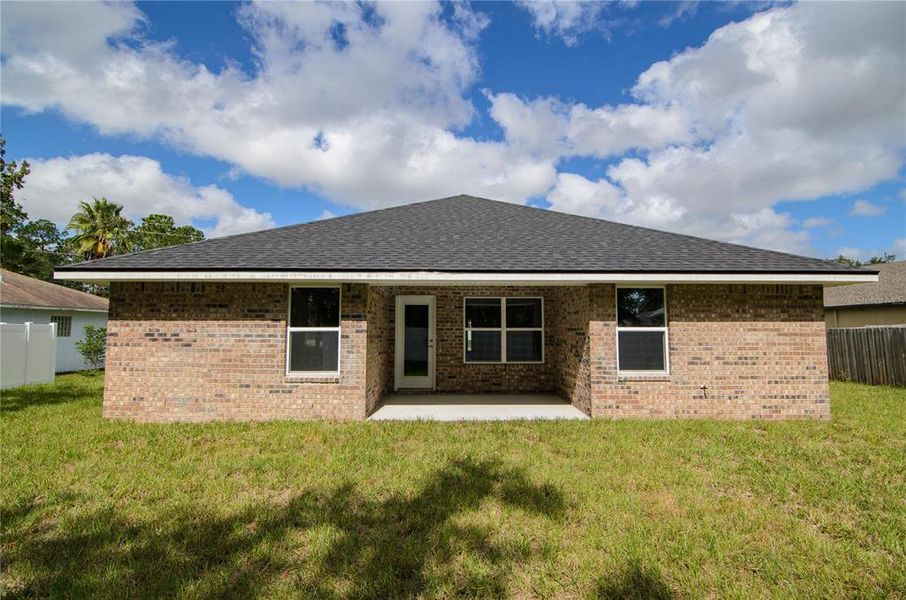Exterior details and patio area of a home in Palm Coast, Palm Coast (Image 25).