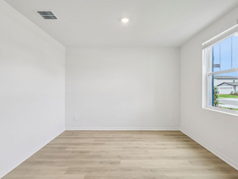 Spacious, unfurnished interior of a new home in The Meadow at Crossprairie, St. Cloud (Image 9).