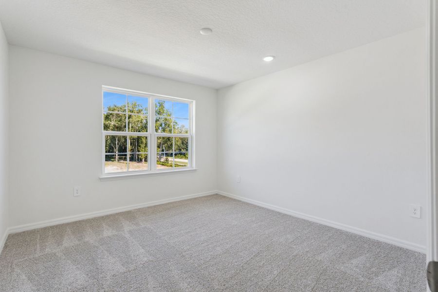 Spacious, unfurnished interior of a new home in Estes Reserve, Eustis (Image 29).