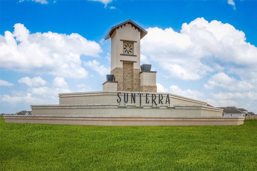 Entrance to the Sunterra: Richmond Collection community in Katy, TX, featuring signage and landscaping (Image 2). Entrance to the Sunterra: Richmond Collection community in Katy, TX, featuring signage and landscaping (Image 2).