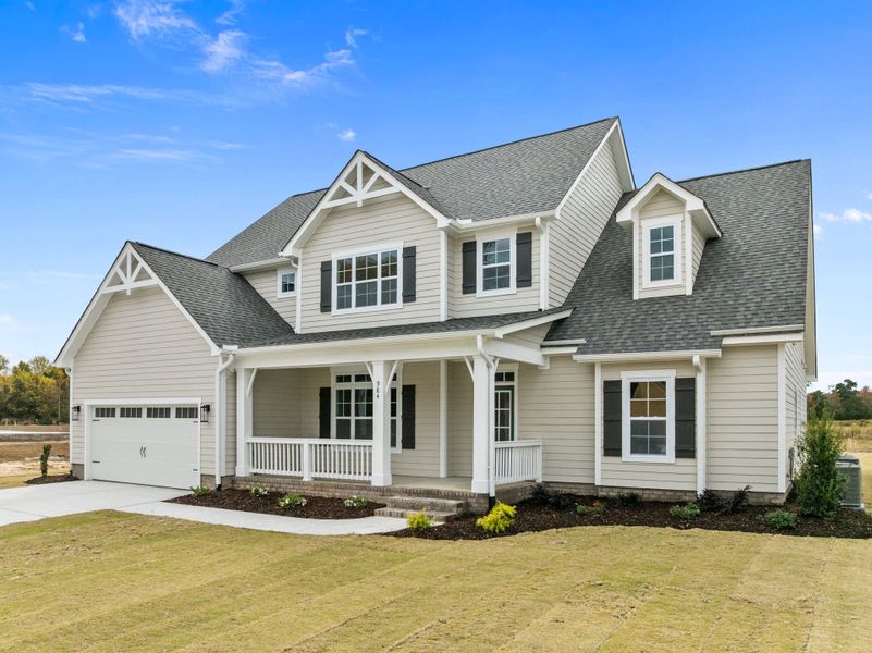 Front exterior of a new home in Eli's Ridge, Winterville, NC, highlighting curb appeal (Image 2).