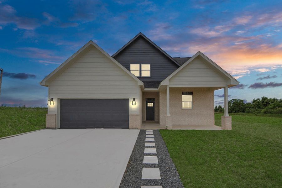 A modern, two-story home with a spacious driveway and a two-car garage. The exterior features a mix of light siding and dark accents, complemented by a neatly landscaped front path. Offering a serene and inviting atmosphere. A modern, two-story home with a spacious driveway and a two-car garage. The exterior features a mix of light siding and dark accents, complemented by a neatly landscaped front path. Offering a serene and inviting atmosphere.