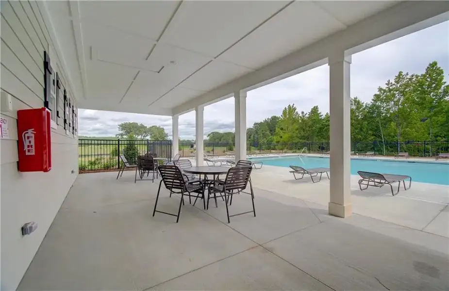 Exterior details and patio area of a home in Rosewood Lake Estates, Hoschton (Image 16).
