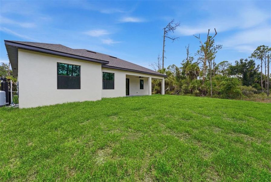 Exterior details and patio area of a home in , Port Charlotte (Image 3).