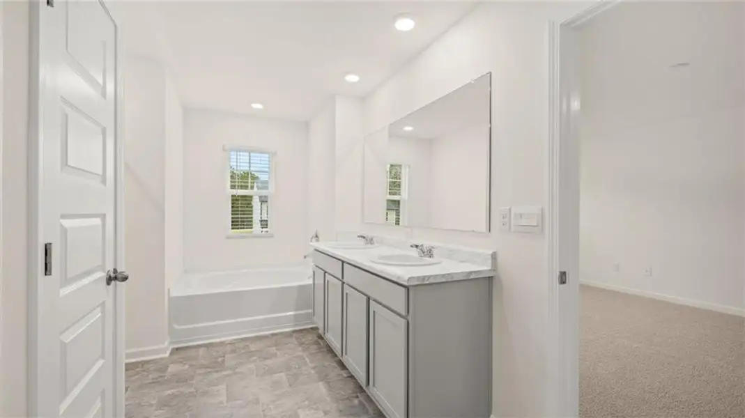 Furnished interior view inside a new home in Champion's Run, Lithonia (Image 5).