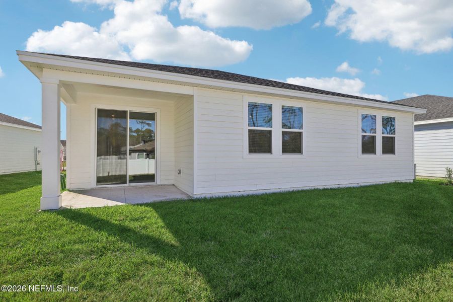 Exterior details and patio area of a home in , Palm Coast (Image 4).