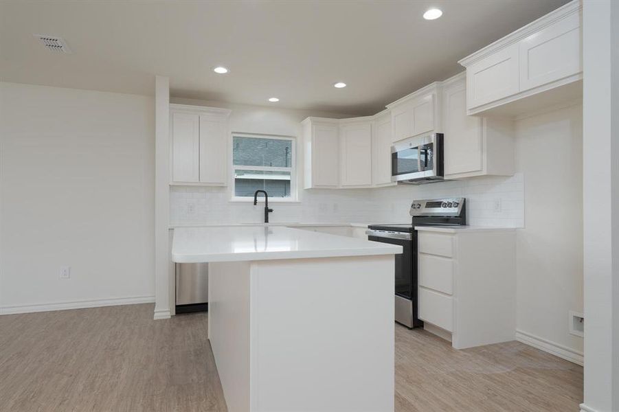 Furnished interior view inside a new home in , Abilene (Image 8).