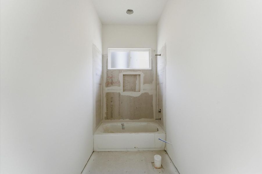 Ensuite bathroom for the third bedroom will offer a vanity with quartz countertops and shaker cabinets and a tub/shower combo.