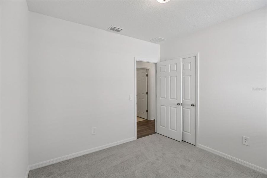 Spacious, unfurnished interior of a new home in Springs at Lake Alfred - Classic Series, Lake Alfred (Image 46).