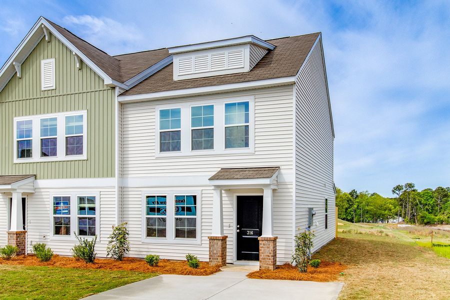 Front exterior of a new home in Padgett Commons, Hopkins, SC, highlighting curb appeal (Image 17).