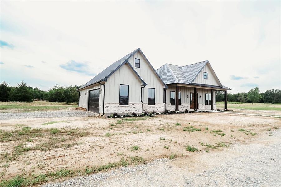 Front exterior of a new home in , Bonham, TX, highlighting curb appeal (Image 2). Front exterior of a new home in , Bonham, TX, highlighting curb appeal (Image 2).