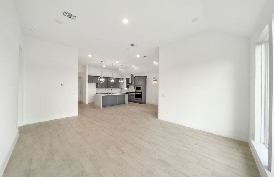 Representative unfurnished interior of a home built from the Chilton by Pulte Homes in Saddleback at Santa Rita Ranch, Liberty Hill (Image 10).