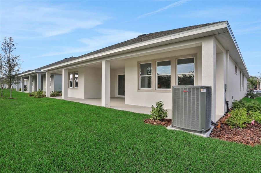 Exterior details and patio area of a home in Angeline, Land O' Lakes (Image 4).