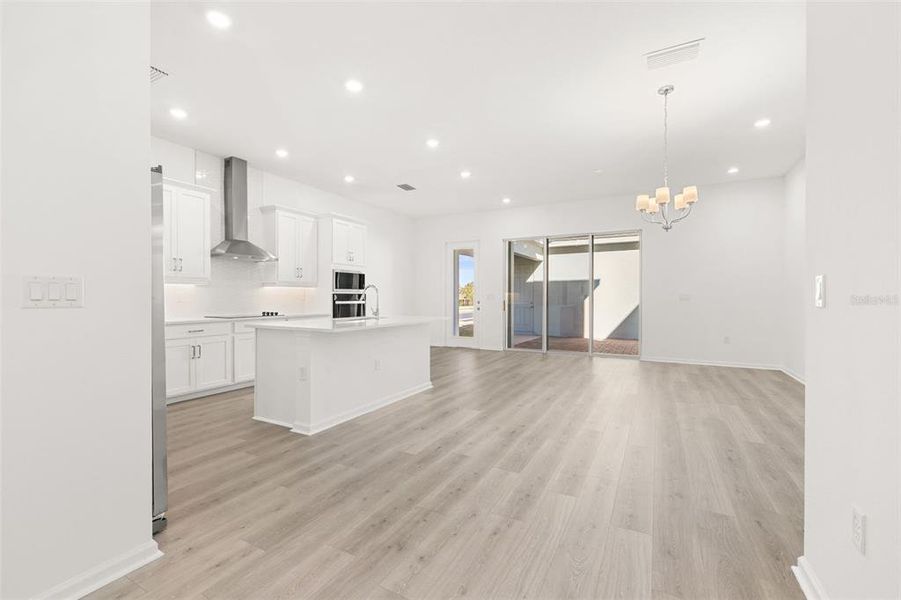 Spacious, unfurnished interior of a new home in Serenade at Ovation, Winter Garden (Image 15).