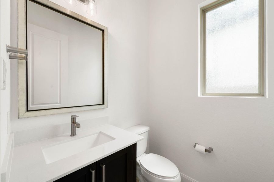 The half bath is located just on the other side of the office.