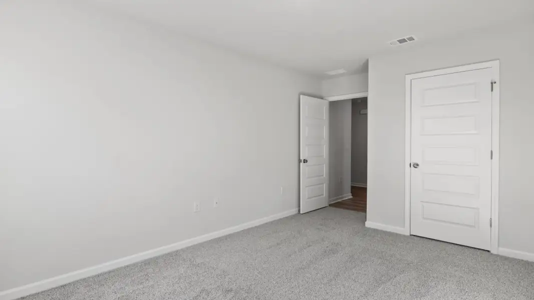 Spacious, unfurnished interior of a new home in Magnolia at the Bluffs Phase 3, Freeport (Image 17).