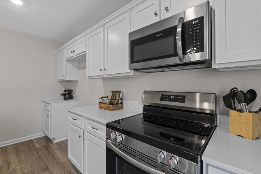 Representative furnished interior of a home built from the Myrtle L by McGuinn Homes in Canary Woods, Hopkins (Image 14). Representative furnished interior of a home built from the Myrtle L by McGuinn Homes in Canary Woods, Hopkins (Image 14).
