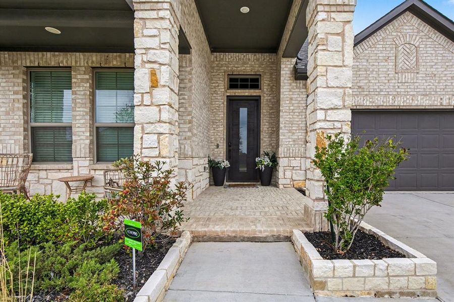 Exterior details and patio area of a home in Silo Mills, Joshua (Image 26).